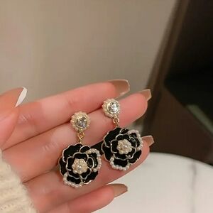 Elegant Black and Gold Floral Earrings